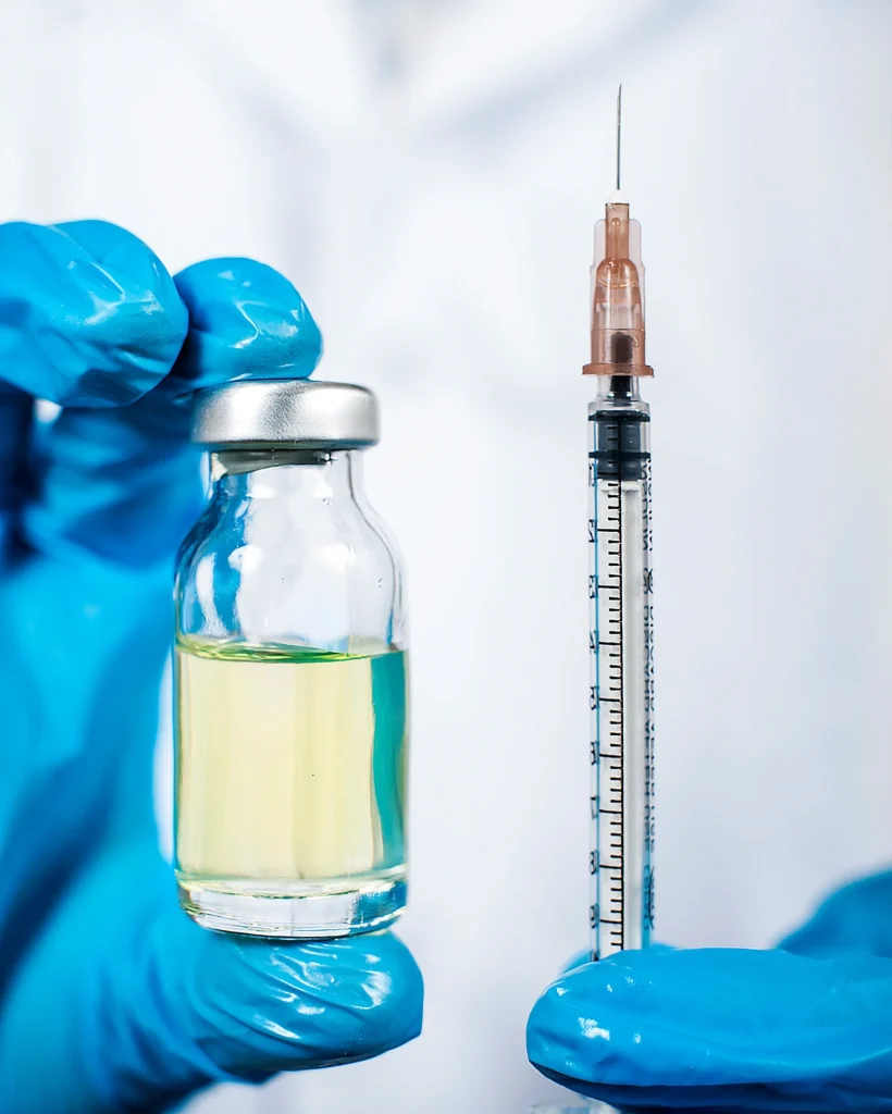 doctor-in-medical-gloves-holding-medicine-and-syri-2026-01-07-06-06-26-utc