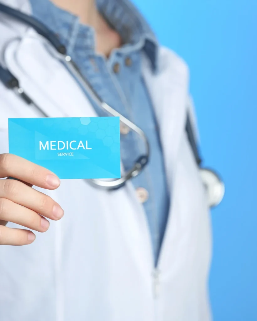 medical-professional-holding-business-card-for-ser-2026-03-05-21-12-42-utc
