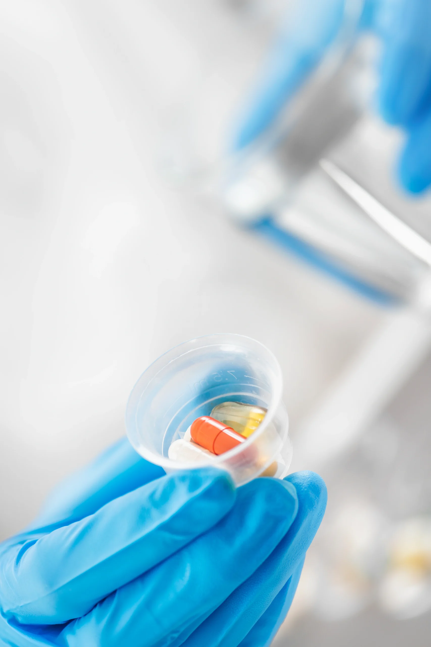 close-up-of-pills-in-medical-professional-s-gloved-2026-03-10-03-34-04-utc