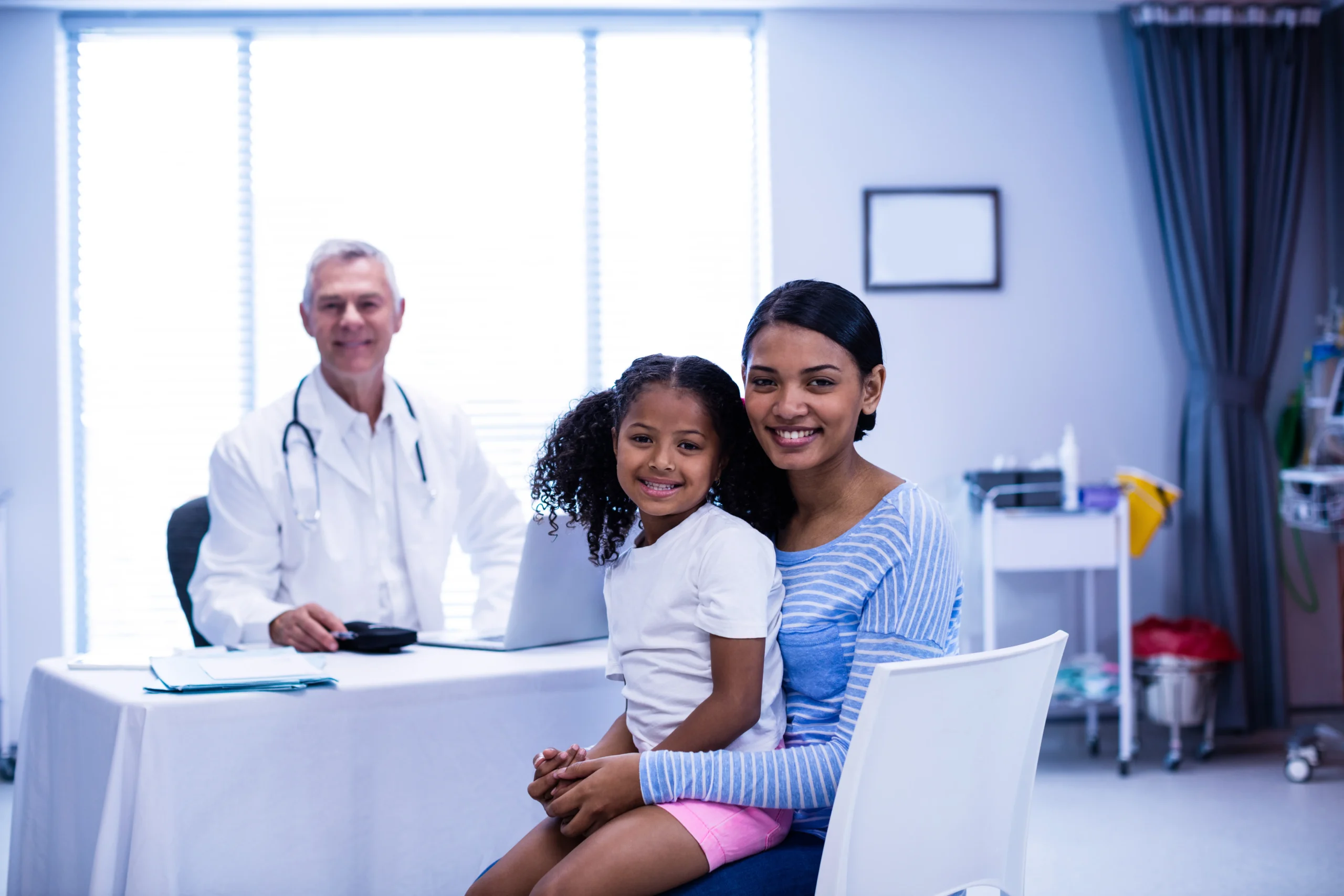 portrait-of-smiling-doctor-and-patient-in-clinic-2026-01-11-10-33-16-utc